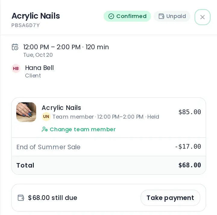 An appointment for acrylic nails: the time, the client, the service with its team member, a discount, the total and a Take payment button.